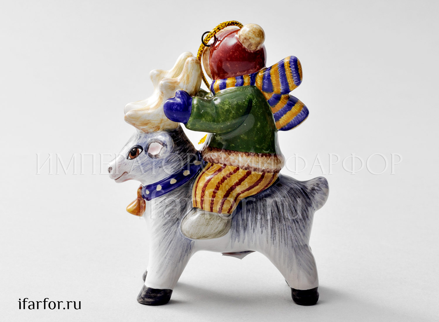 Елочная игрушка «Мальчик с шарфиком на олене»